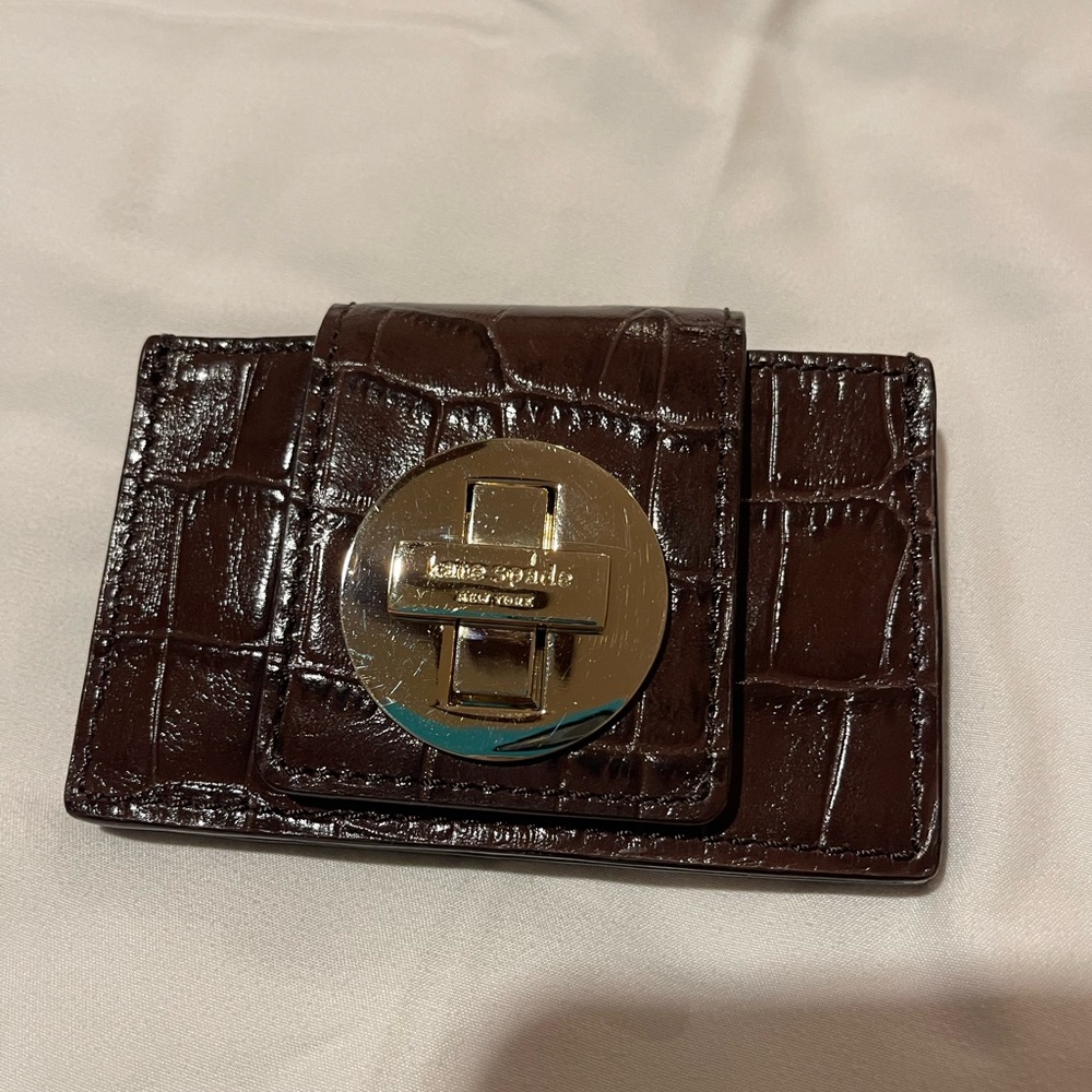 Kate Spade card case. Color: Brown
